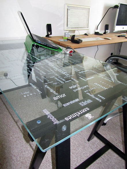 Glass table with the word Love wrote in many languages!